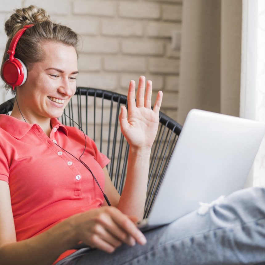 front-view-smiling-woman-with-laptop