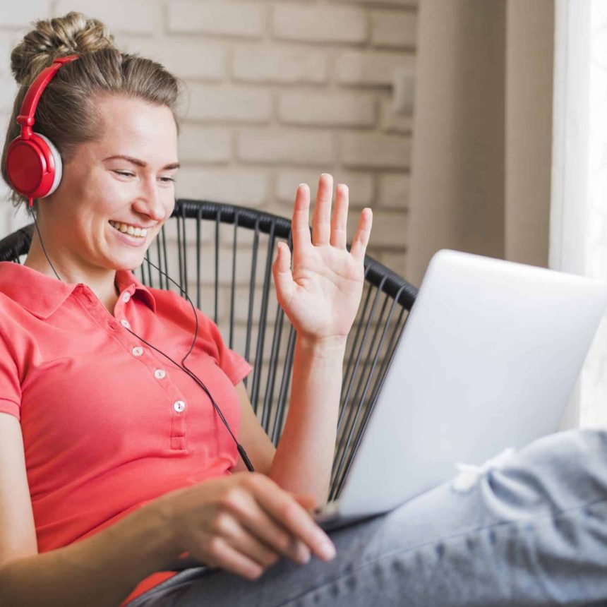 front-view-smiling-woman-with-laptop